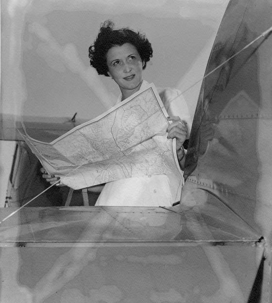Aline Rhonie Planning a Flight, Date & Location Unknown (Source: Roberts)