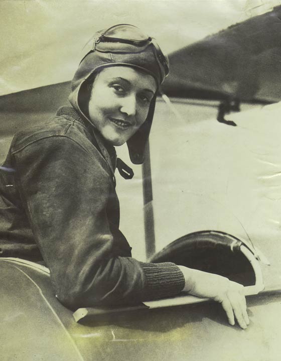 Aline in Cockpit, Date & Location Unknown (Source: Roberts)