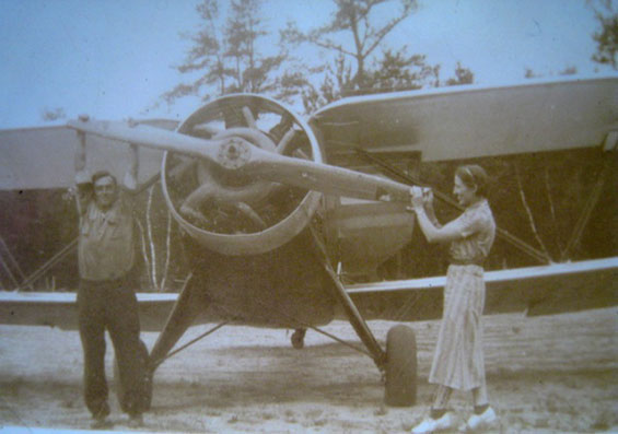 Two Unidentified People With NC12455 (Source: Apte)