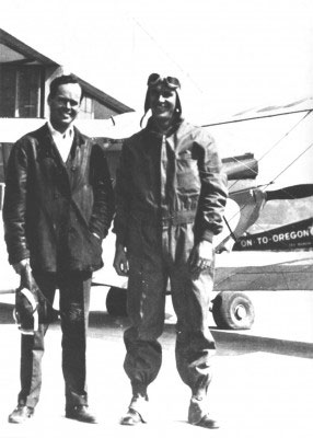 Laurence Lombard, left, and Frederick Blodgett prepare to depart Portland, Oregon, for Seattle. In the background is the Stinson &ldquo;On-to-Oregon&rdquo; that Tex Rankin of Portland was using to try to set an endurance record.