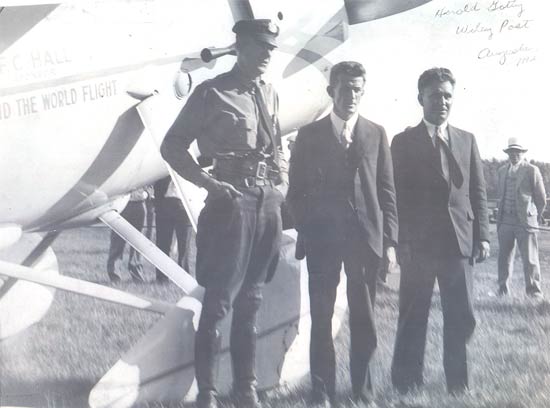 Wiley Post, right; Harold Gatty, center ca. 1931