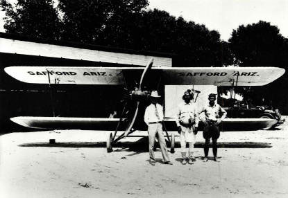 Ernest Wickersham, Chief Cintotie of the San Carlos Apaches and Charlie Mayse with Wickersham's J-5 Waco in Safford, AZ (Source: ASL)